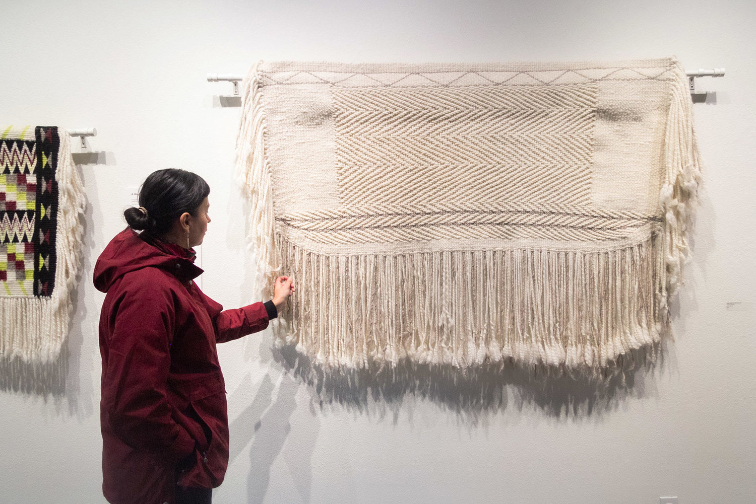 Selena Kearney curated the show “A Weaver’s Voice” to reflect the lineage of teachers and students who are keeping alive the tradition of Coast Salish weaving.